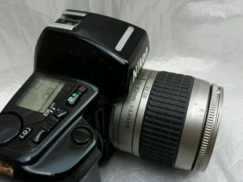 Vendo 60 Fijos Camara Nikon N90s con lente  - Imagen 2
