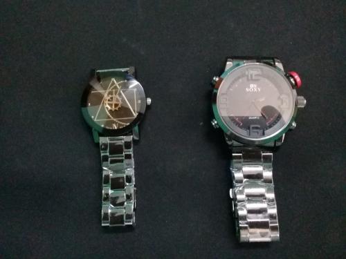 Relojes para dama y caballero de acero inoxid - Imagen 1
