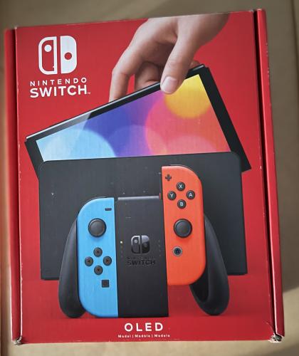 Vendo Nintendo Switch Oled color rojo/azul nu - Imagen 1